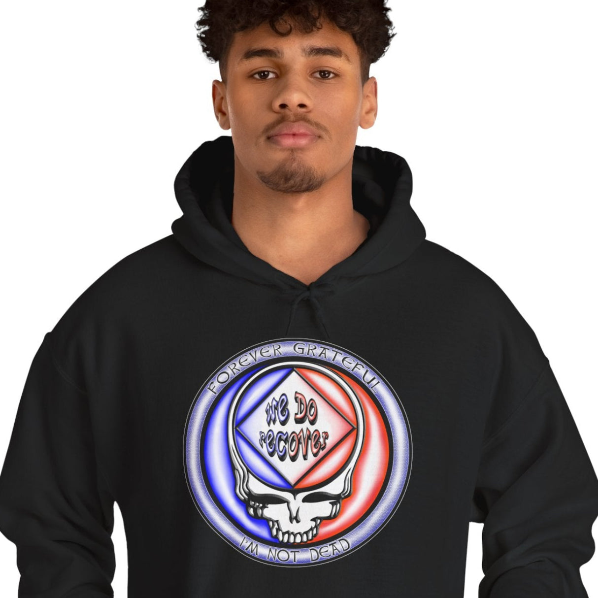 Person wearing a black hoodie with a colorful logo on a white background