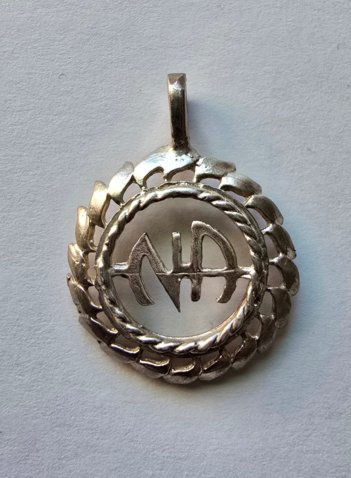 tsg560 Silver Pendant, Stylish NA Symbol 1 - CLEARANCE