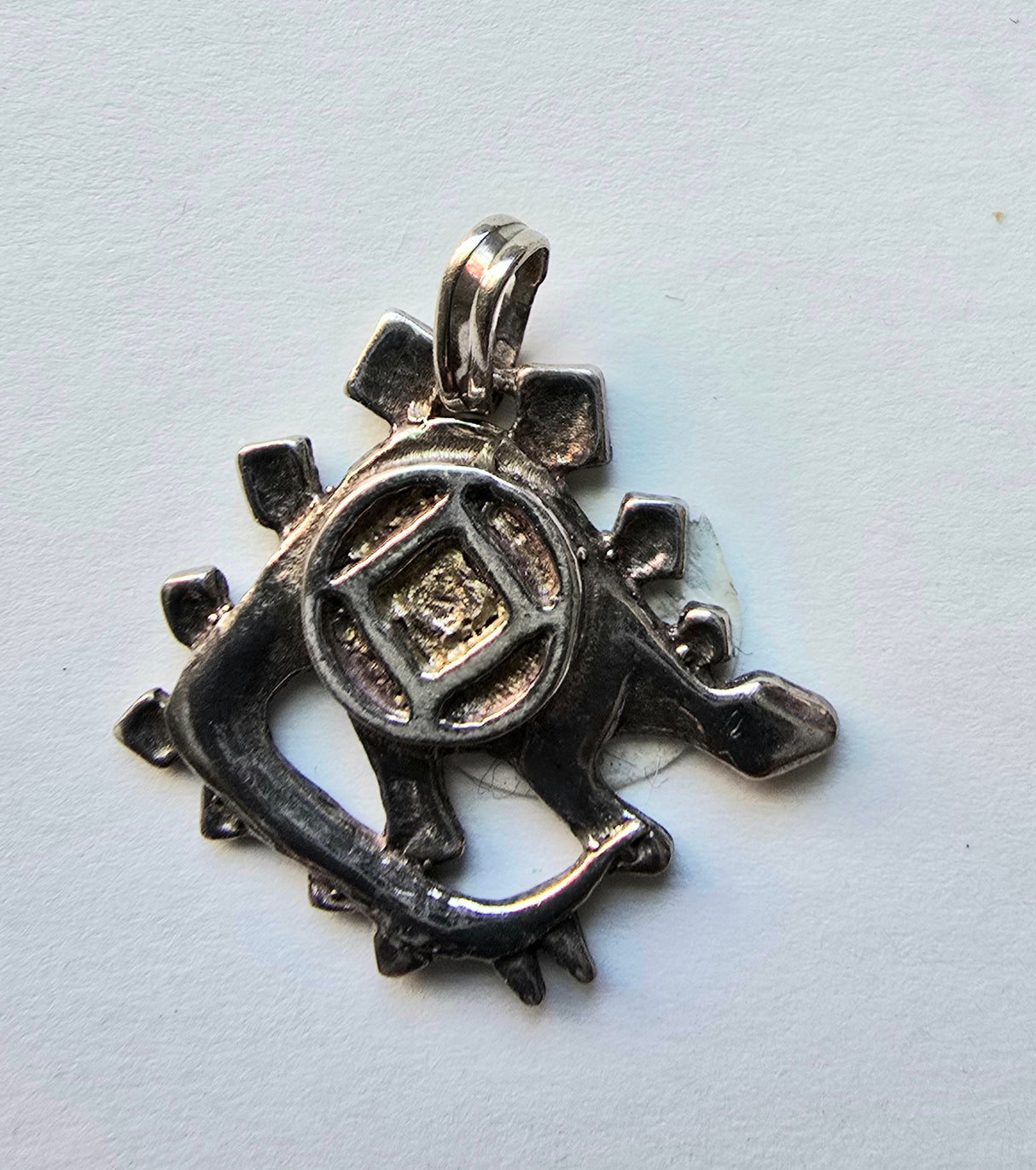 tsg562 Silver Pendant, Dino With NA Symbol CLEARANCE