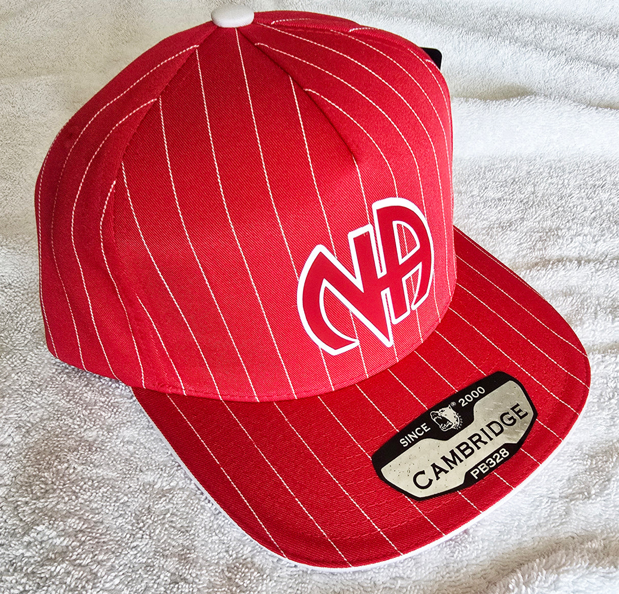 Ball Cap Red Striped NA Symbol Snapback