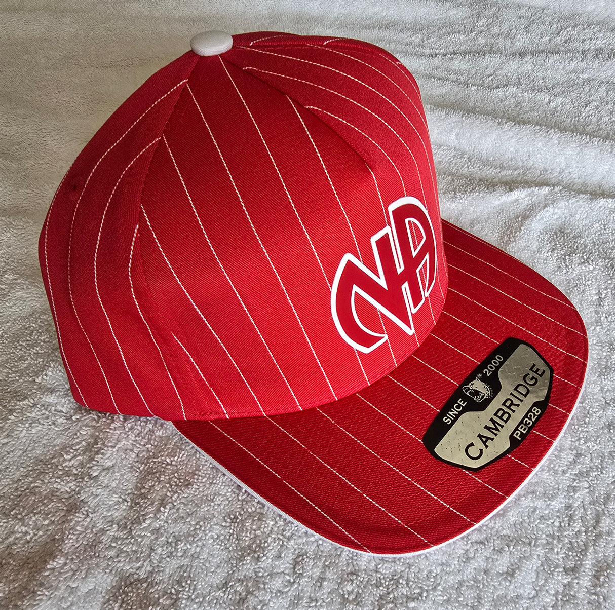 Ball Cap Red Striped NA Symbol Snapback