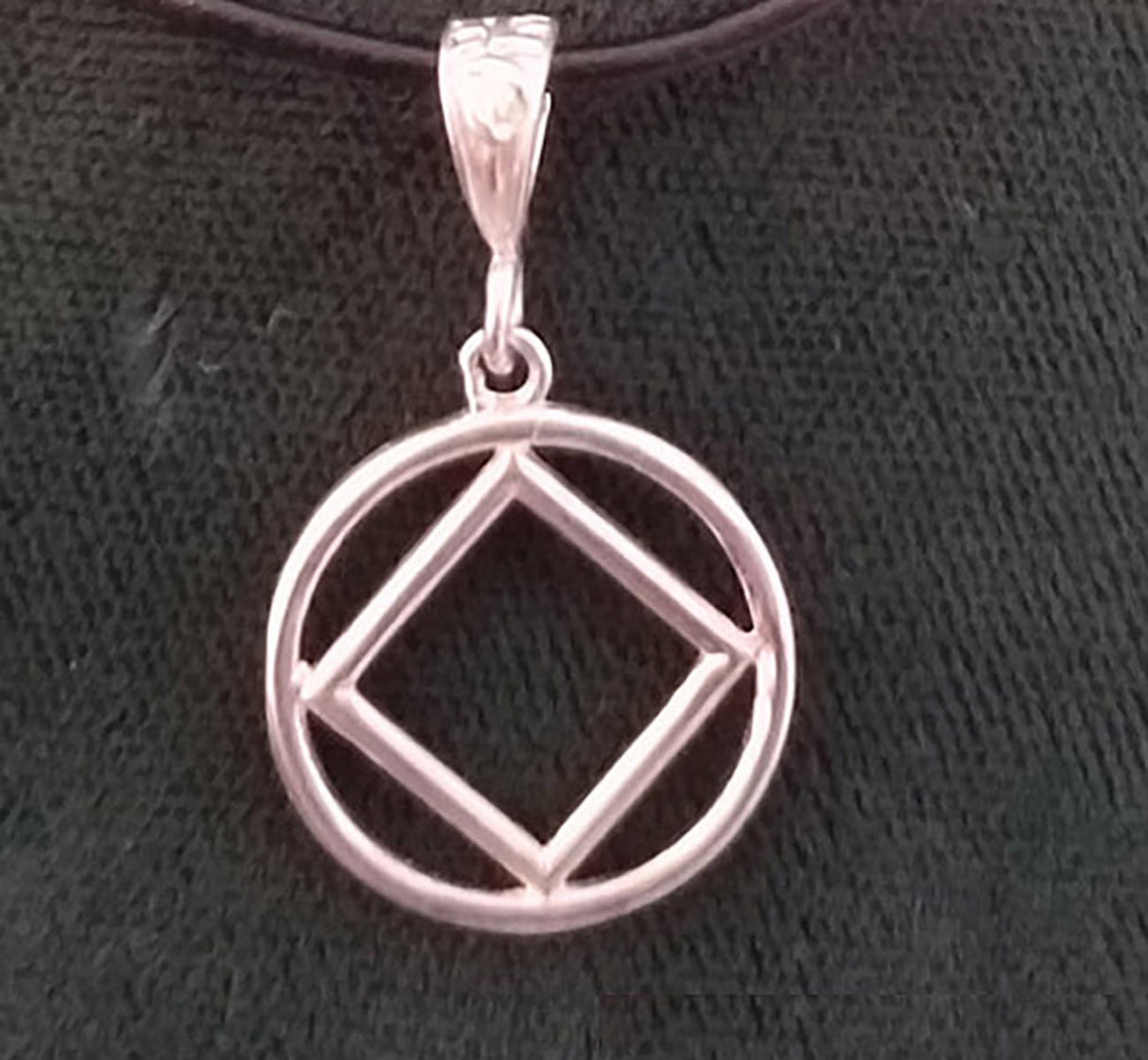 NA DIME SIZE SERVICE SYMBOL PENDANT - nawears