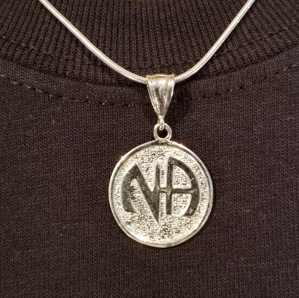 ssj003- Nickel Size NA Symbol Pendant