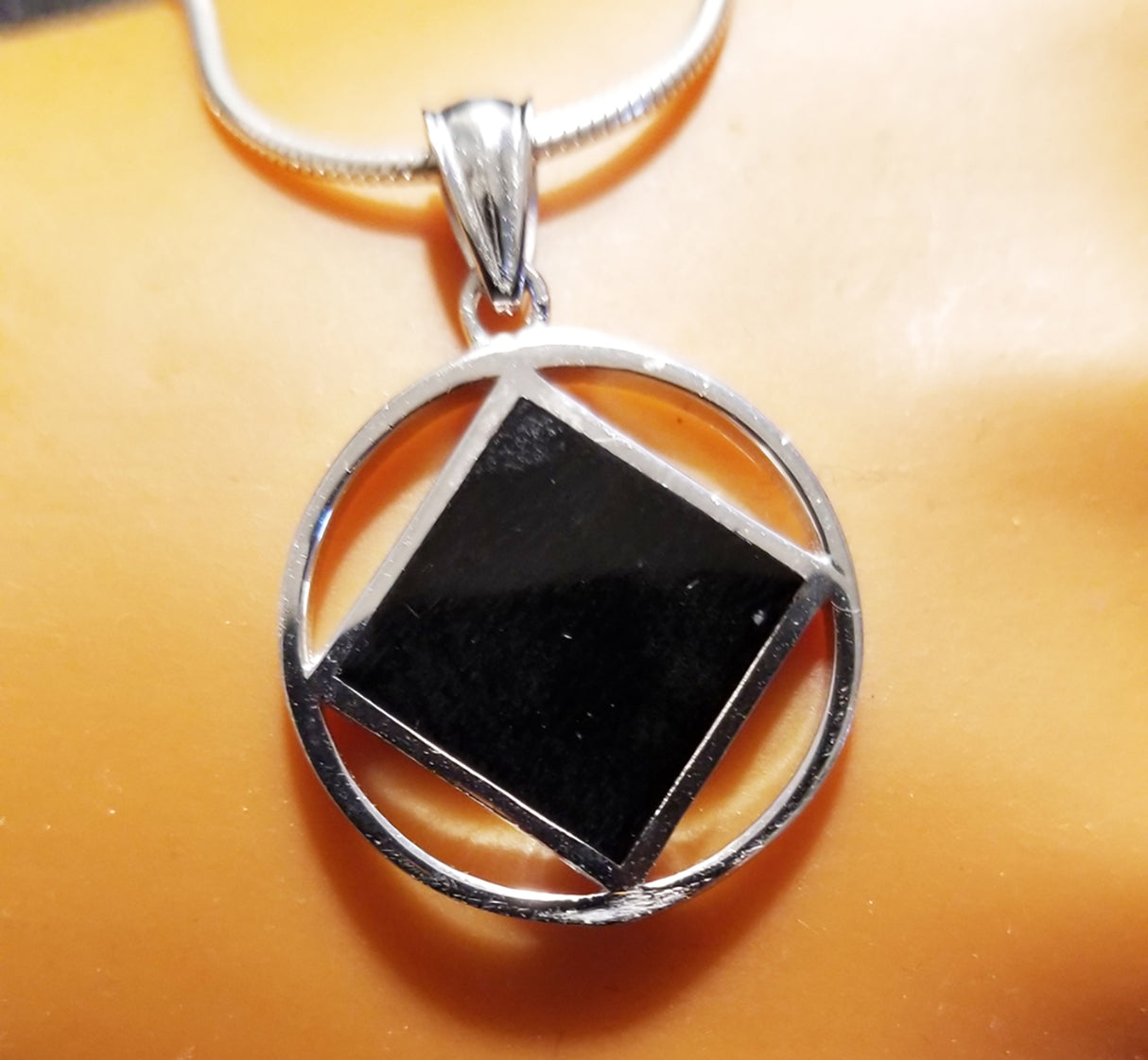 NA MEDIUM SIZE SILVER & BLACK PENDANT - nawears