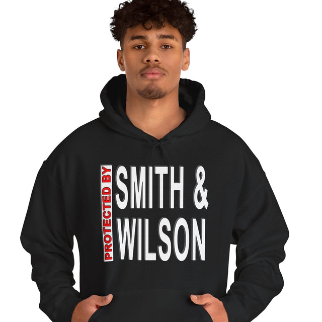 Person wearing a black hoodie with 'Smith & Wilson' text on a white background