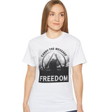 Woman wearing a white t-shirt with 'Carry the Message Freedom' design on a white background