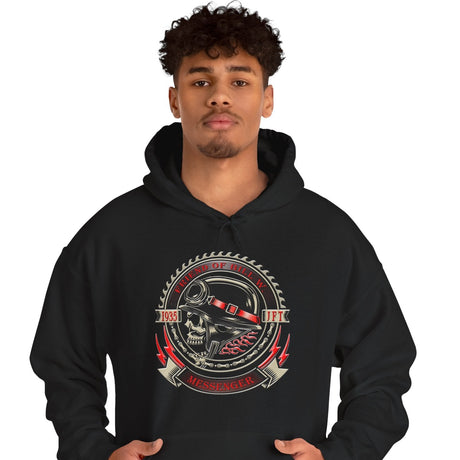 Person wearing a black hoodie with a graphic design on a white background