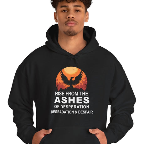 Person wearing a black hoodie with a motivational quote and graphic design on a white background