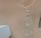 Sterling Silver Dangling Symbol Earrings