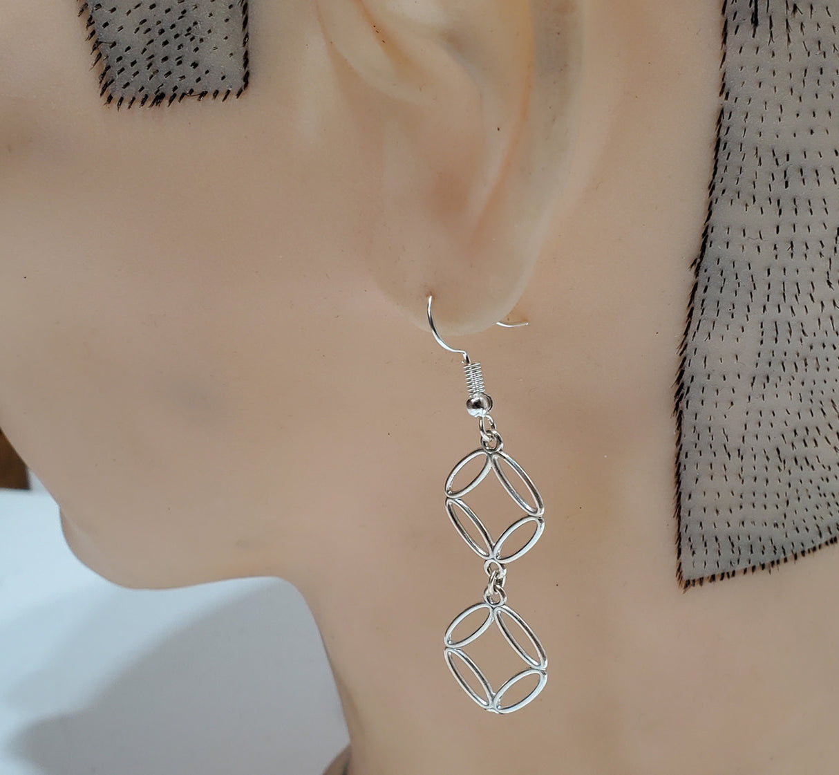 Sterling Silver Dangling Symbol Earrings