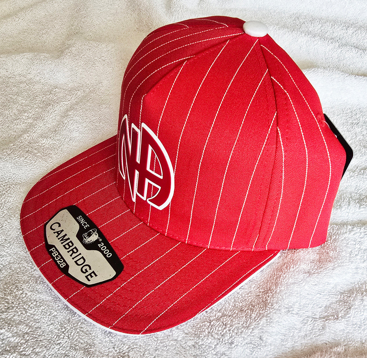 Ball Cap Red Striped NA Symbol Snapback