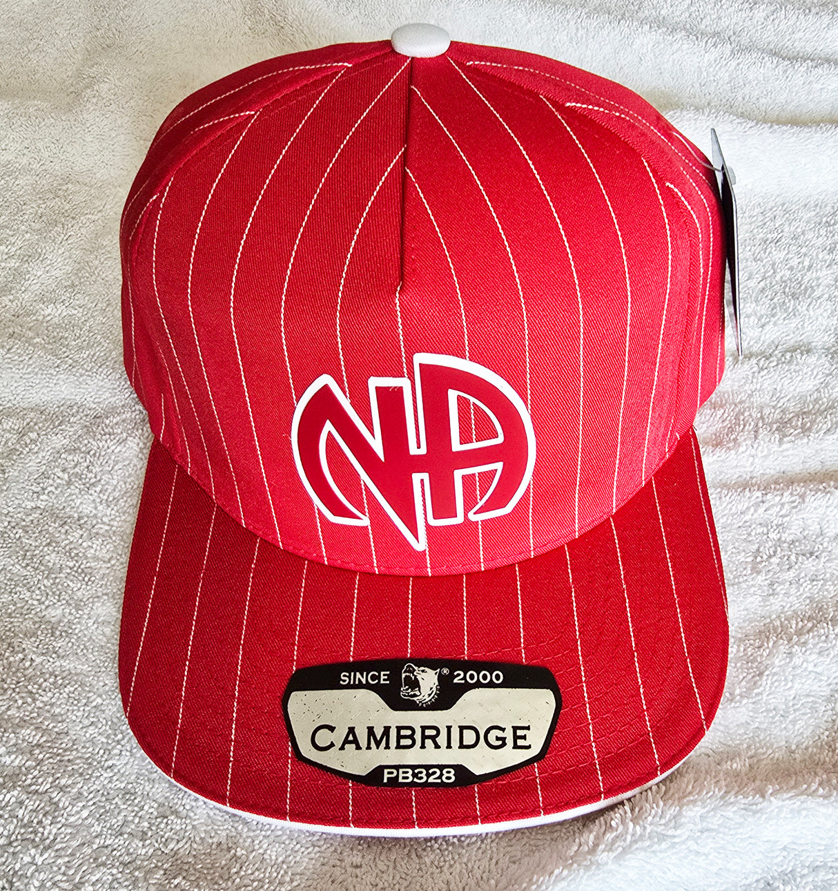 Ball Cap Red Striped NA Symbol Snapback