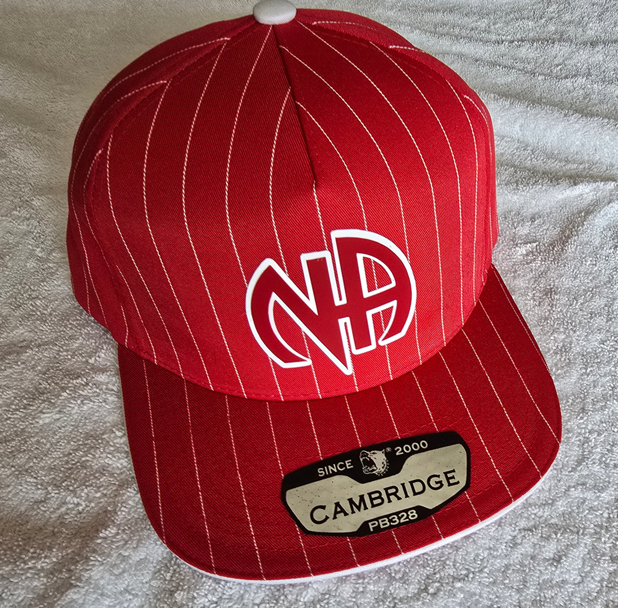 Ball Cap Red Striped NA Symbol Snapback