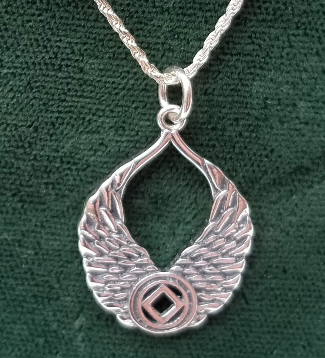 ssj007- Wings With NA Symbol Pendant